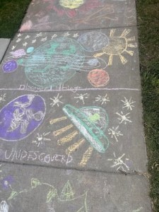 Show kid's sidewalk art in my neighborhood.